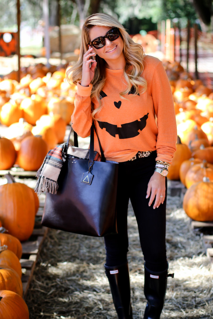 Wildfox Pumpkin Sweatshirt. What to wear to the pumpkin patch. Black Hunter Boots. October Plaid Scarf._